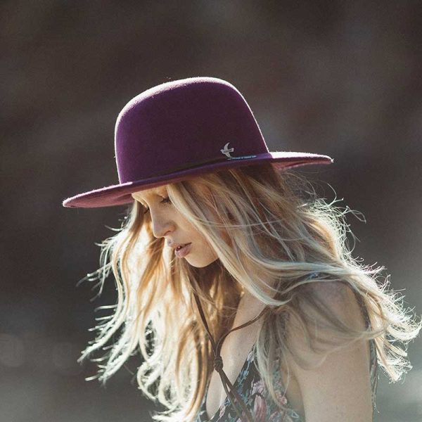 Girl wearing the plum color Bird & Feather Wool Felt Hat