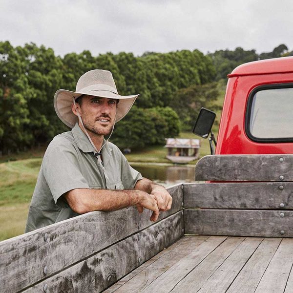 man wearing a Airflow Lightweight Recycled Hat by Conner Hat