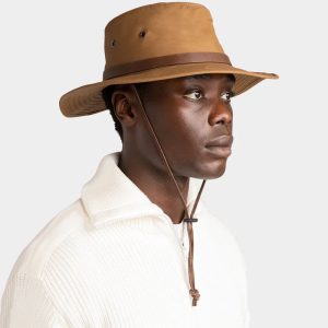 man wearing the Waxed Rugged Fedora by Tilley Endurables